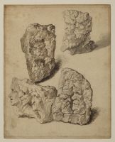 Rocks in front of grotesque heads