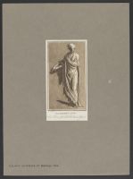 Standing figure holding book