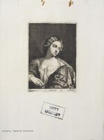 Young lady in a green dress with a box