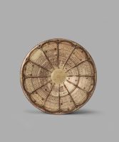 Dish decorated with lustred relief design