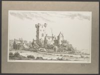 View of a small castle on a lake, a footpath in front of it
