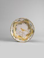 Dish decorated with a yellow bird