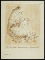 Seated monk reading a book
