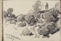 Boulders, with a standing man, and trees, background