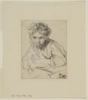 Portrait of a girl with her arms folded leaning out a window