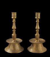 O.1966.GP.216 Pair of candlesticks of cast bronze with silver overlay, each  with a coat of arms (formerly called 'Belegno of Venice'), and a  blank shield
