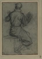 Seated man seen from behind