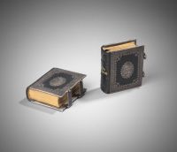 O.1966.GP.40.2 Minature engraved picture book of the New Testament, bound in  leather with silver mounts (pair with O.1966.GP.40.1)