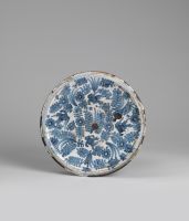 Dish with foot, decorated in blue and white with birds, flowers  and leaves