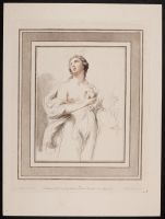 Woman holding a dove and a lilly