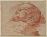 Head and shoulders of a child in swadding cloth