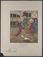 Man riding bicycle through town