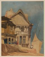 Houses on quayside, with small fishing vessels