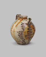 Jug decorated in orange, manganese and green