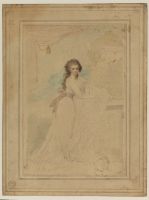 Lady standing by a garden ornament