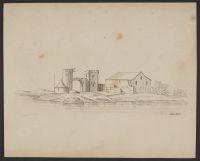 A group of buildings including towers and a house
