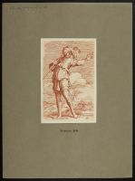 Figure of a man in a hat holding a staff