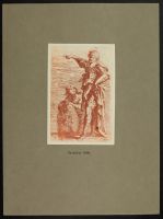 Two men, one standing and one kneeling with a shield
