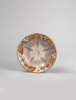 Plate with painted slip decoration of leaves and festoons