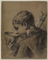 Boy drinking from a bowl