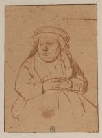 Woman seated with hands clasped on her lap